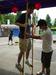 Me, trying in vain to balance myself on bamboo stilts.
