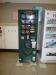 A slightly blurry shot of the coffee vending machine itself, well-stocked as always.  It sits next to a "brick" vending machine, which dispenses 250-mL cardboard packs containing juices, milk, and other flavored drinks.