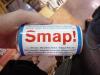 Smap! is a popular boy band in Japan.  To commemorate their most recent album, a beverage company produced a cherry-flavored soda in cans marked with the band's name.  The can design also serves as the CD's cover art.
