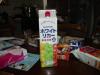 Packaged like milk, looks like fruit juice, but that's "Suntory White Liqueur."  Mmm, mmm.