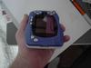 The side of the SwanCrystal features an expansion port.  To plug in headphones or connect to another WonderSwan unit, you can plug in adapters sold separately.  The lack of a built-in headphone jack is a minor annoyance with the SwanCrystal.