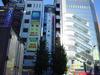 One of the many Sofmap stores in Akihabara caters exclusively to Apple products, and features a five-story-tall poster promoting the new iMac.